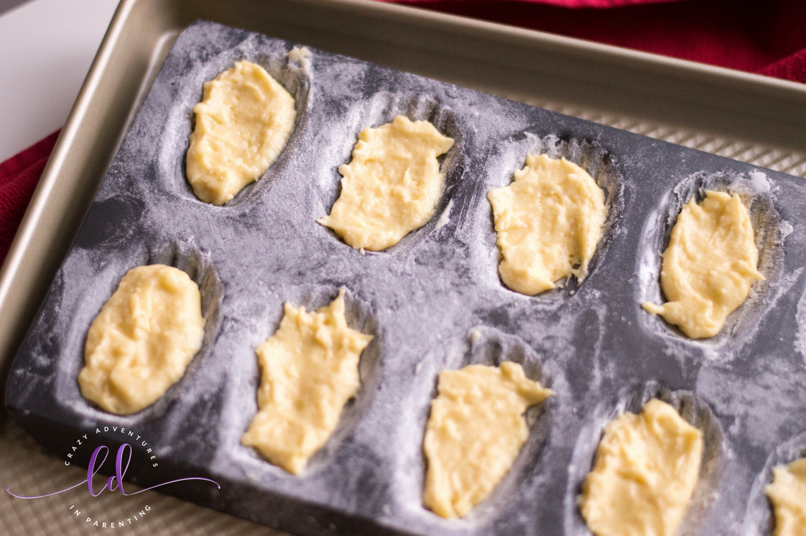 Batter for Lemon Madeleines in madeleine pan