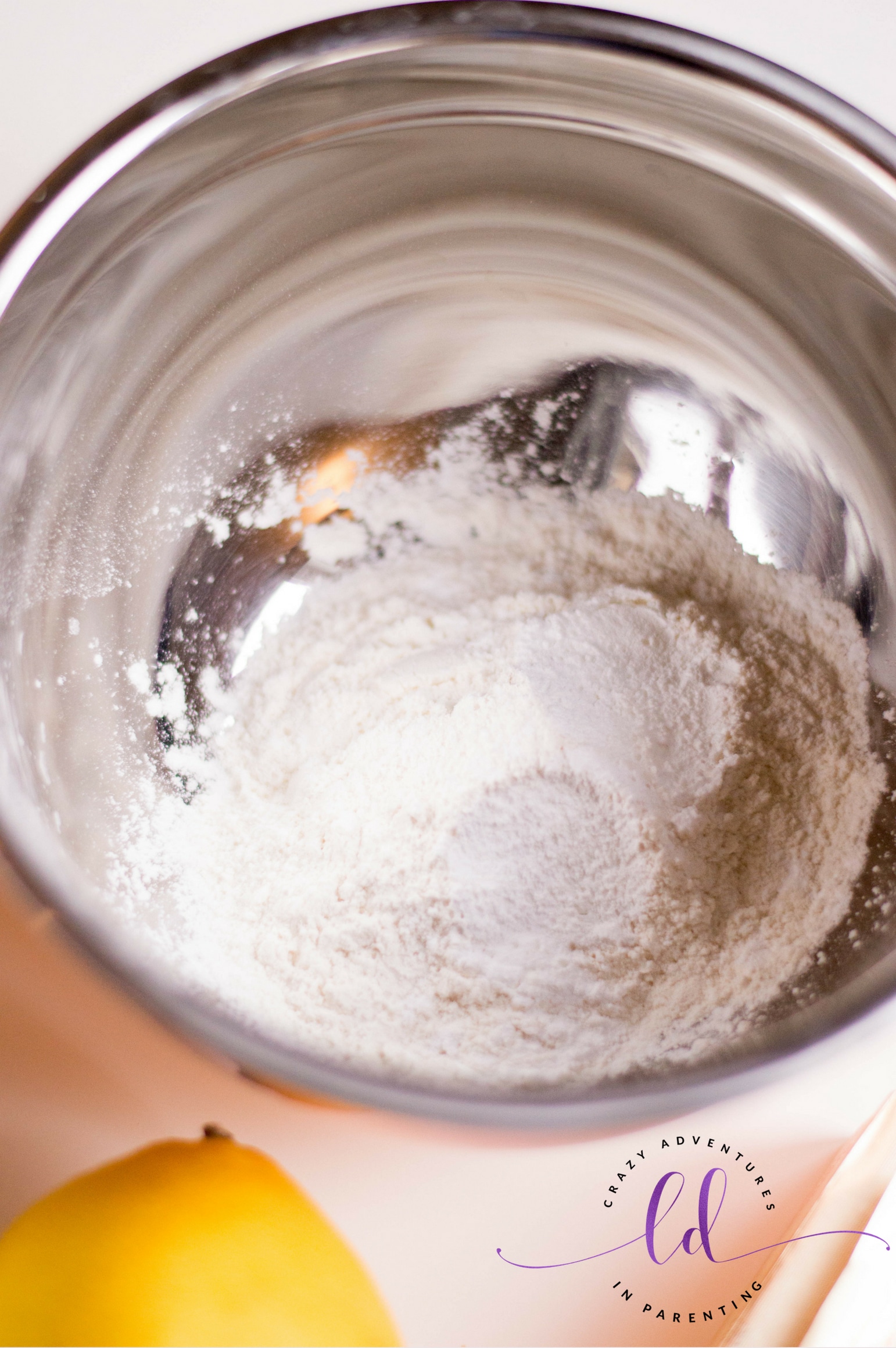 Sifted flour for Lemon Madeleines