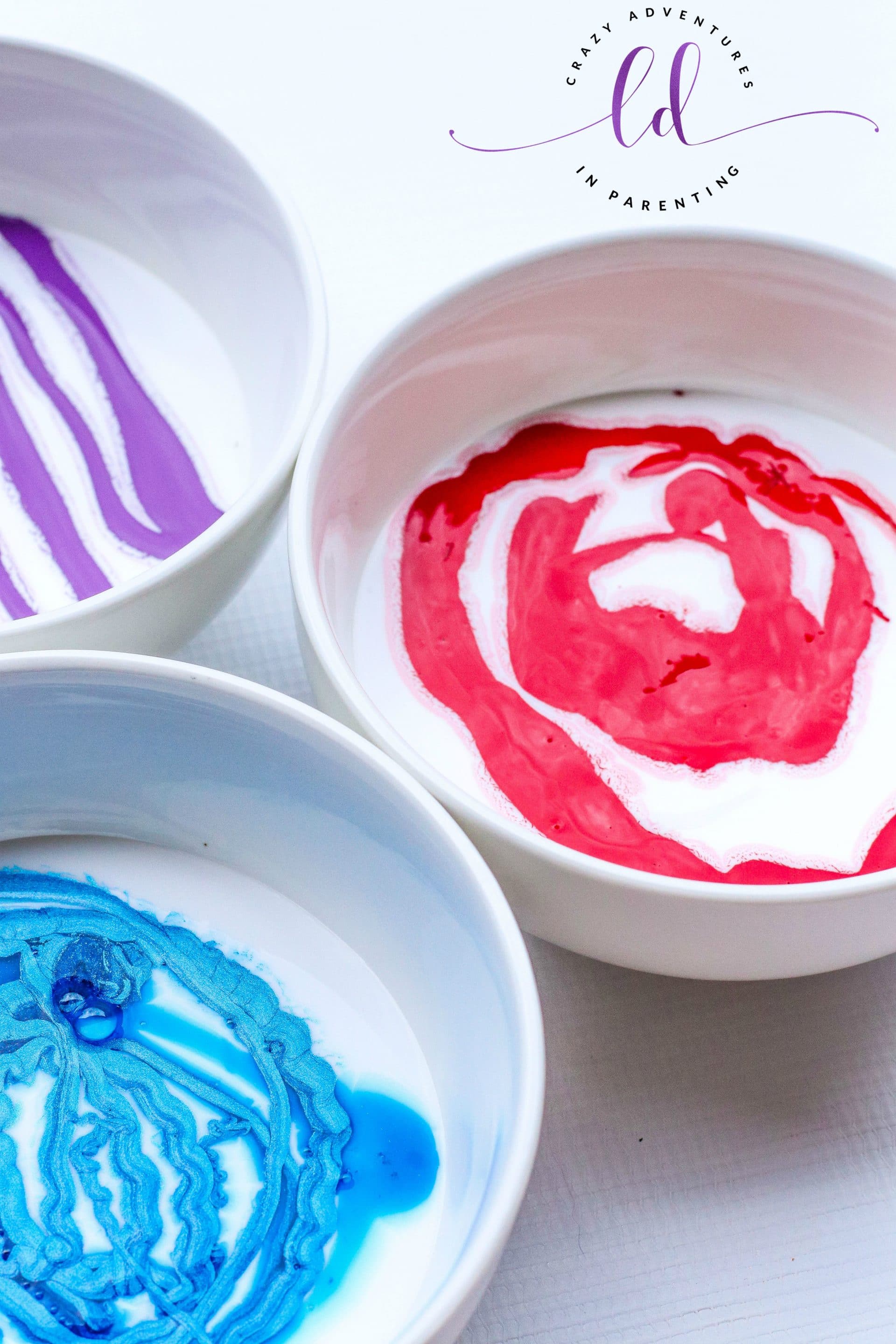 Mixing glue and color for Spiderman Slime recipe