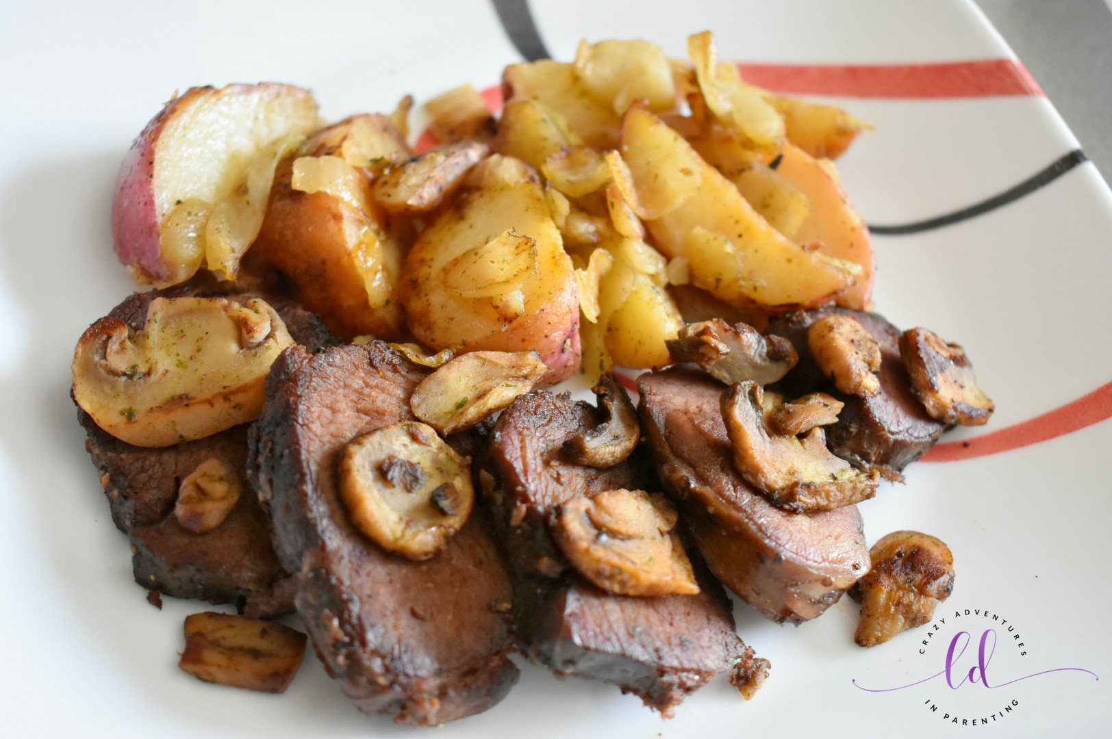 Tyson Fully Cooked Dinner and Entrée Kit - Seasoned Steak Fillet & Mushrooms plated ready for sauce