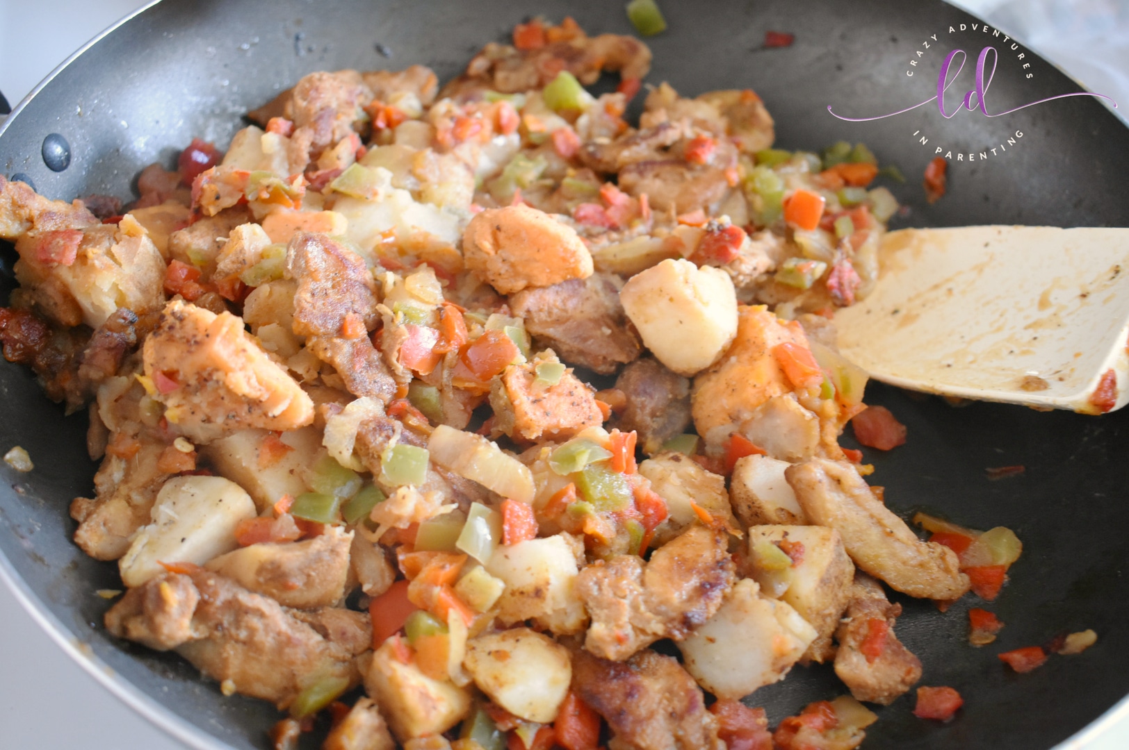 Tyson Sweet Chipotle Chicken & Vegetable Hash sauté ingredients together