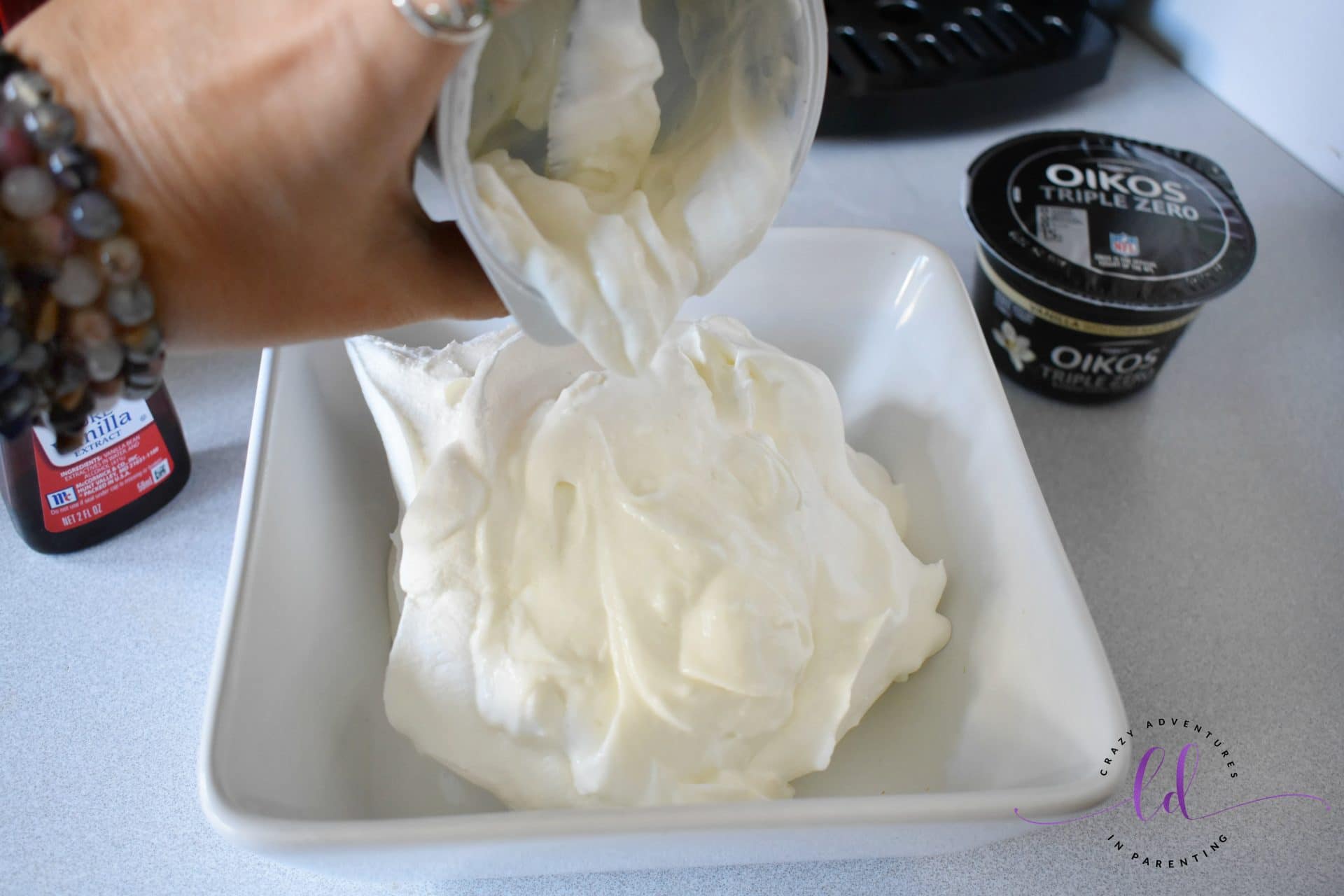 Oikos Triple Zero added to whipped cream