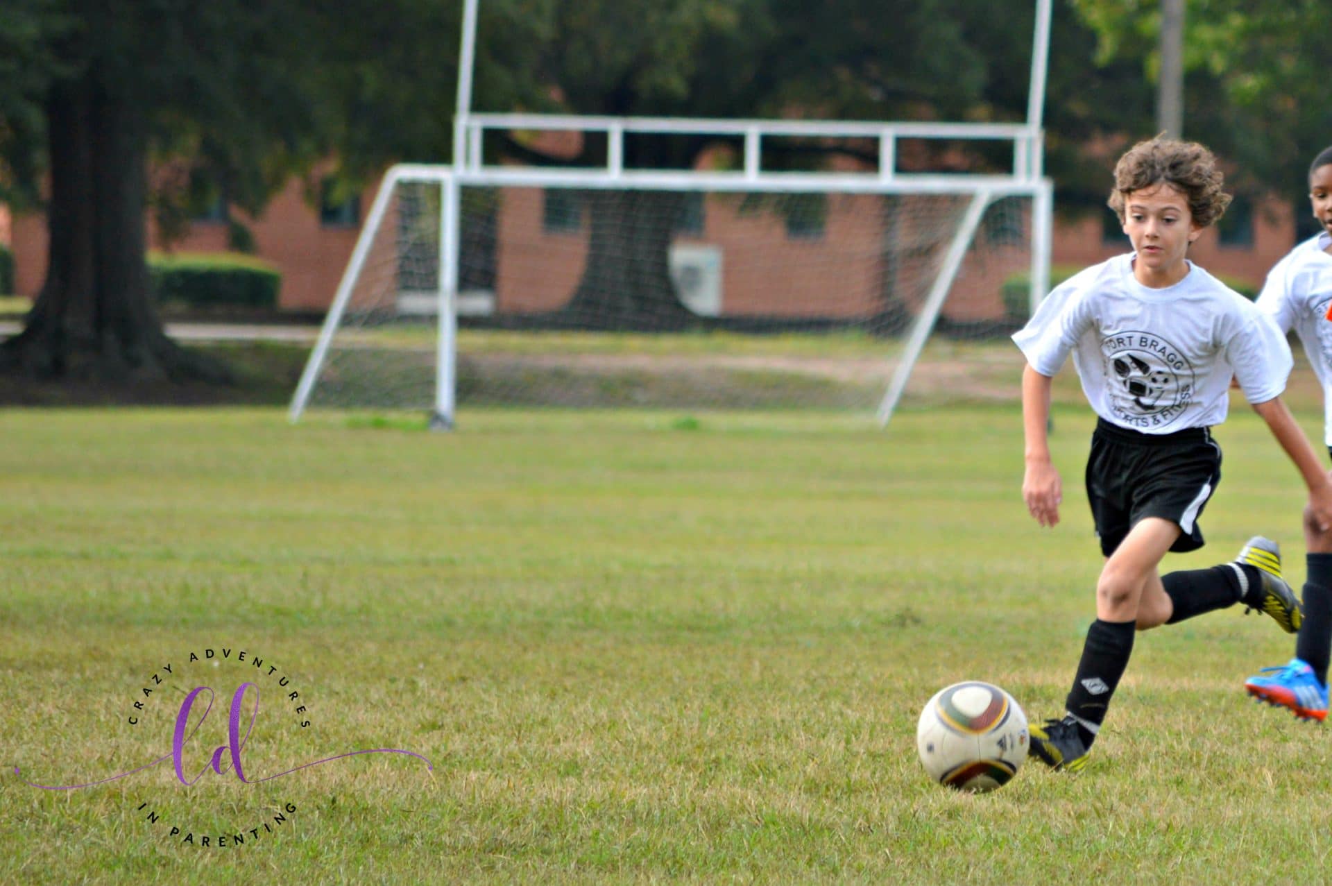 Son playing soccer