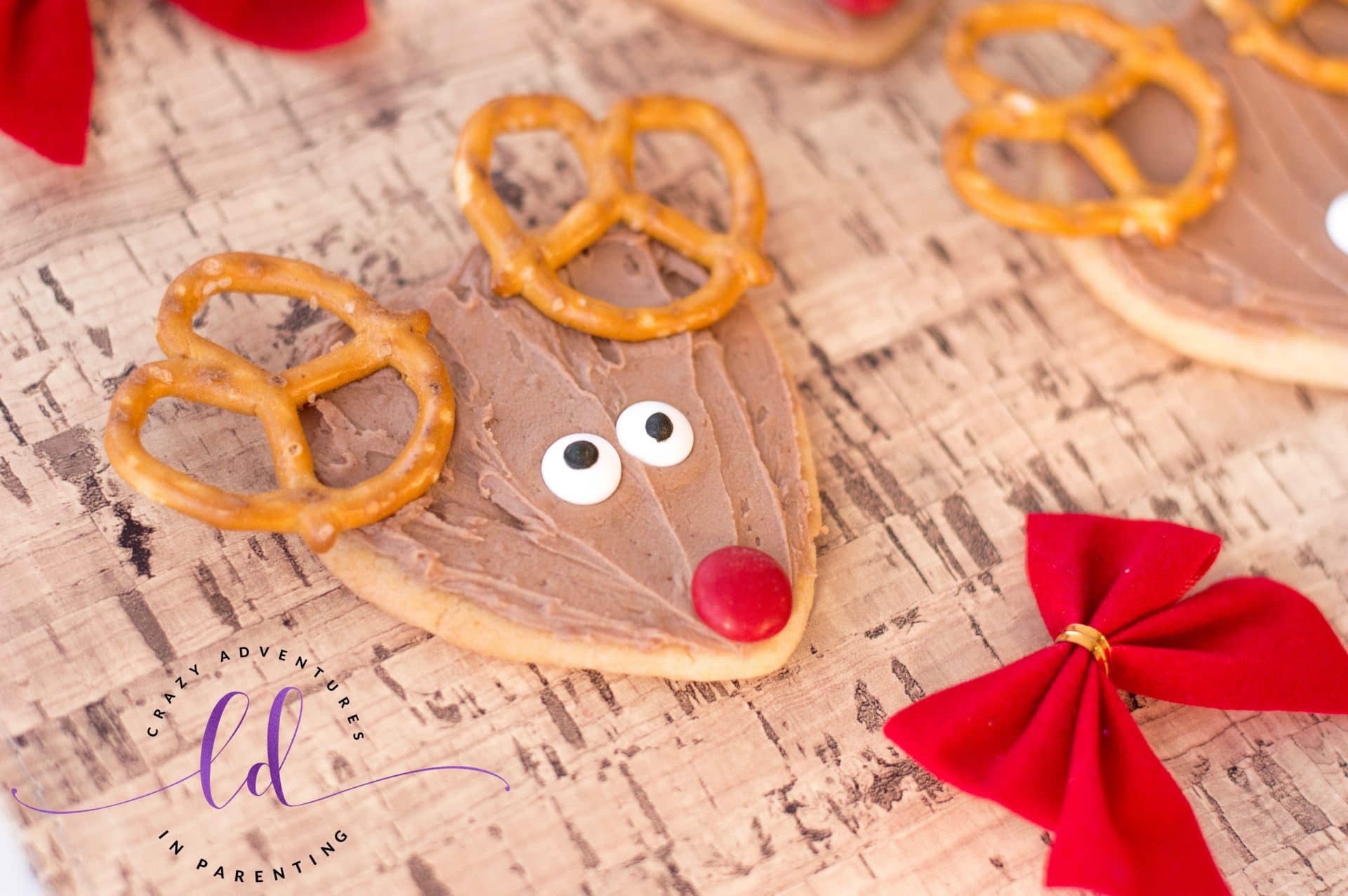 Add Nose and Eyes to Rudolph Cookies