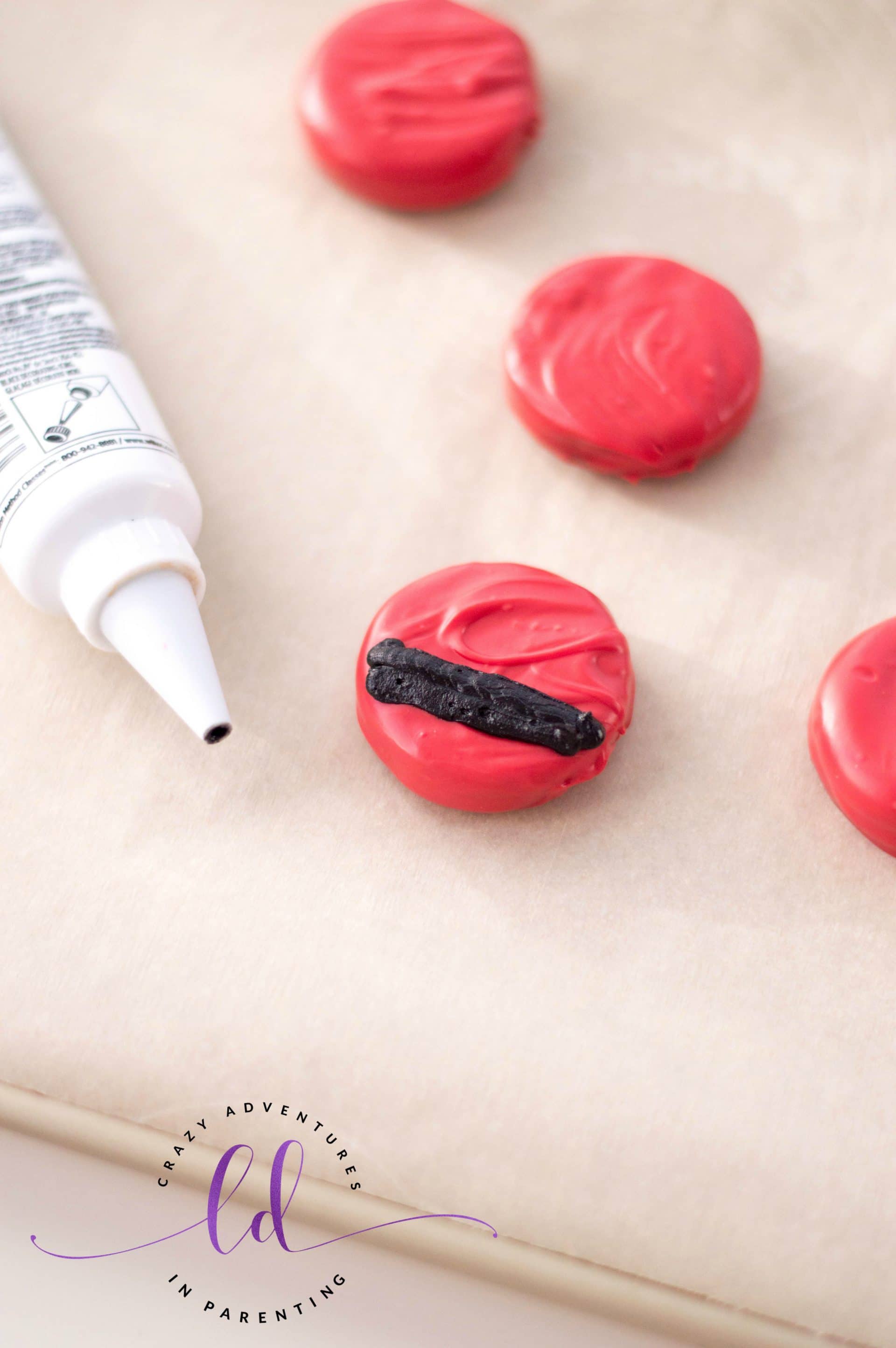 Adding Santa's Belt on Candy Covered Oreos