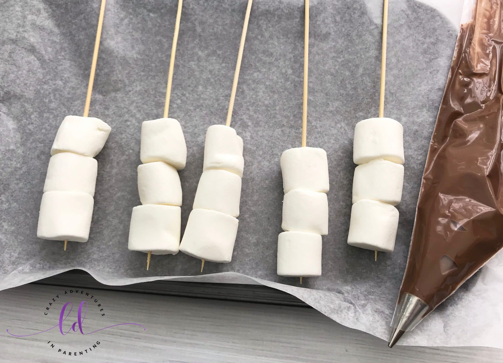 Assemble Marshmallows for Marshmallow Snowman Stirrers
