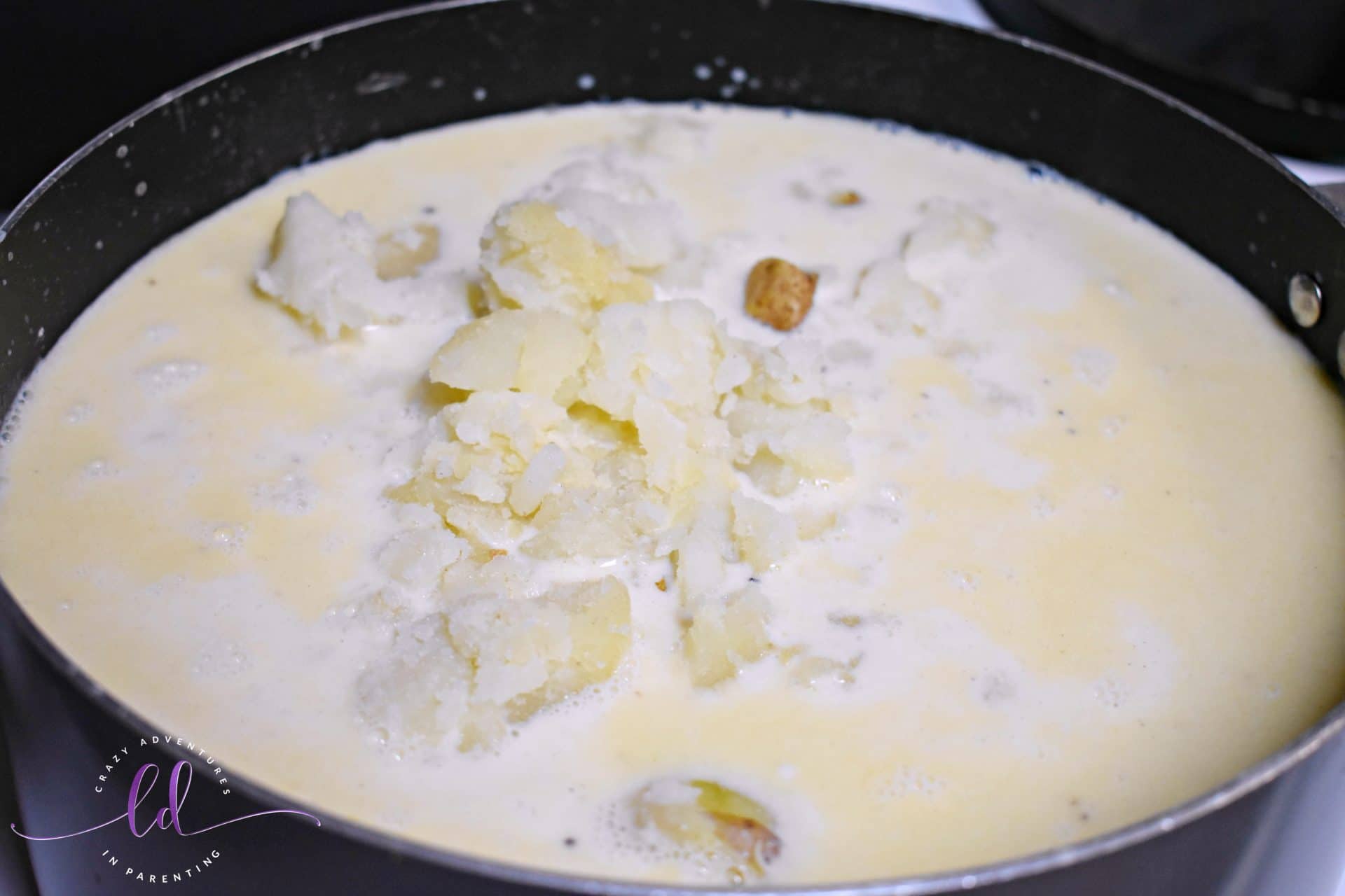 Add Potatoes to Best Potato Soup Recipe Ever