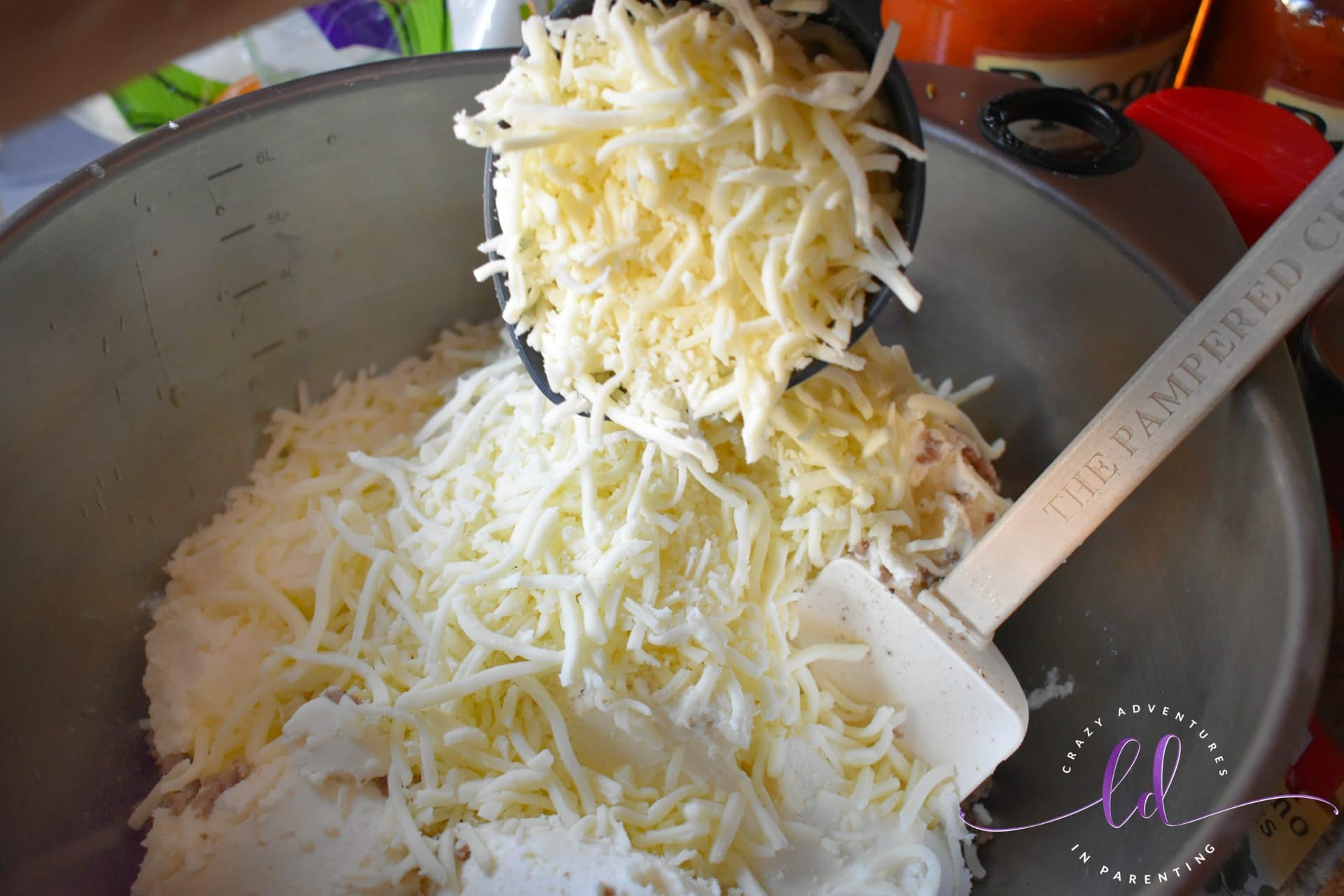 Add mozzarella cheese to meat mixture for homemade lasagna