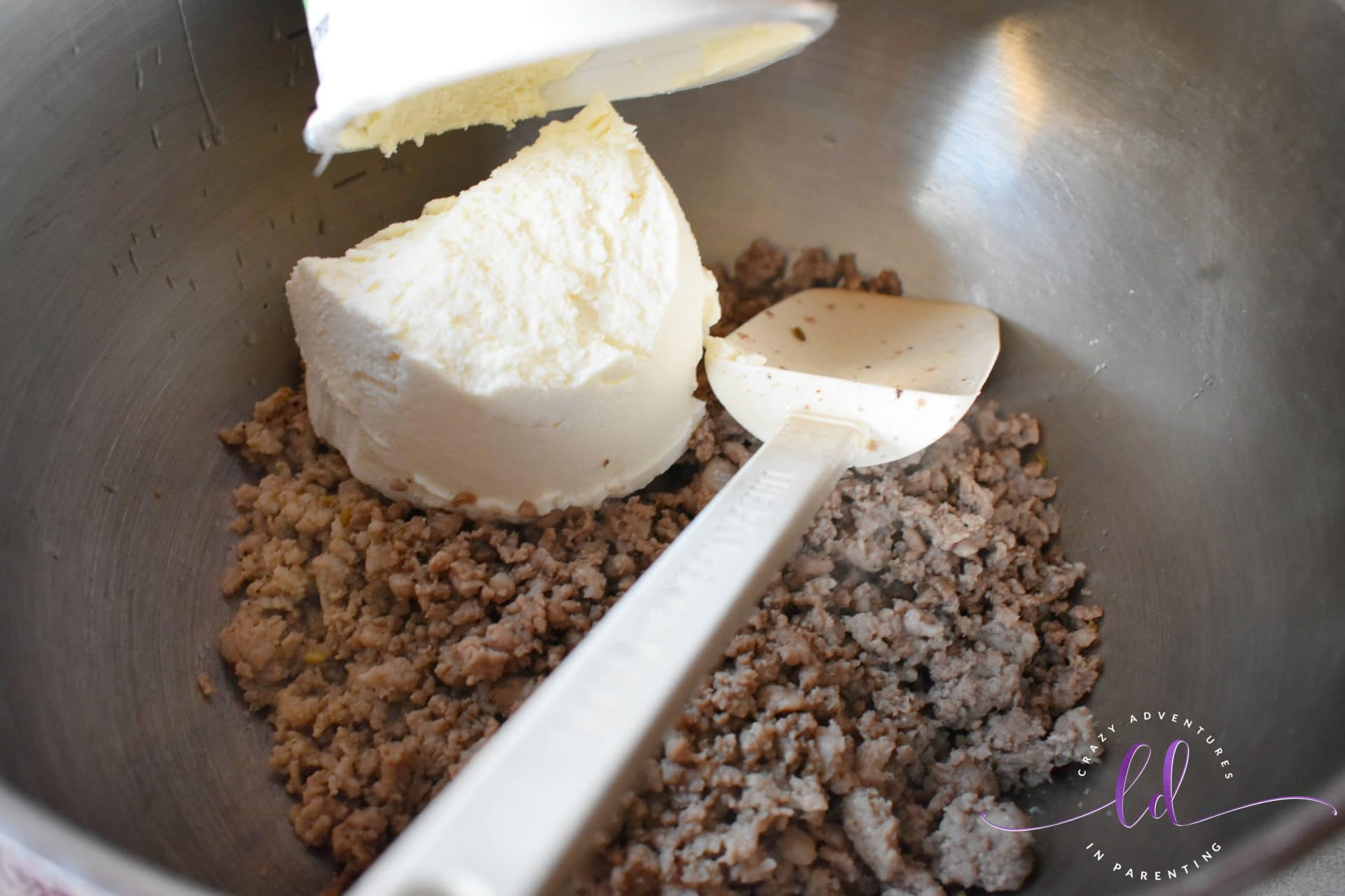 Add ricotta to meat for homemade lasagna