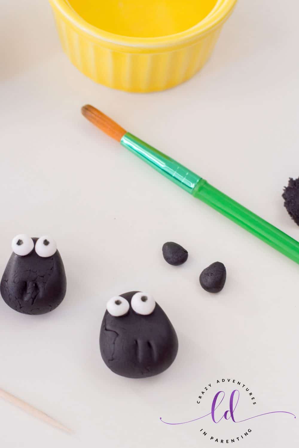 Creating Ears from Black Fondant for Sheep Cupcakes
