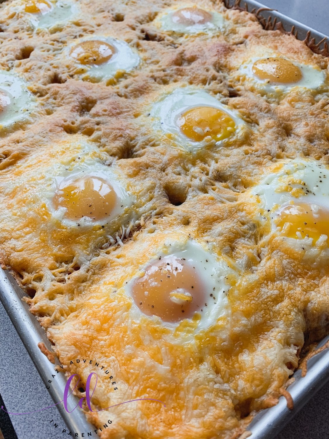 Fresh From the Oven Sheet Pan Cheesy Baked Egg Toast