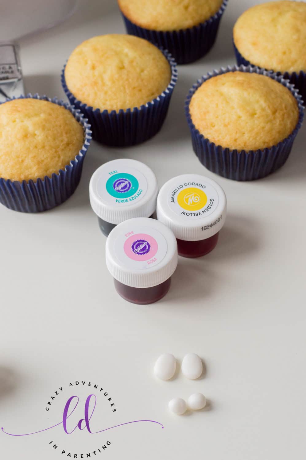 Create fondant spheres for Tie-Dye Poop Emoji Cupcakes