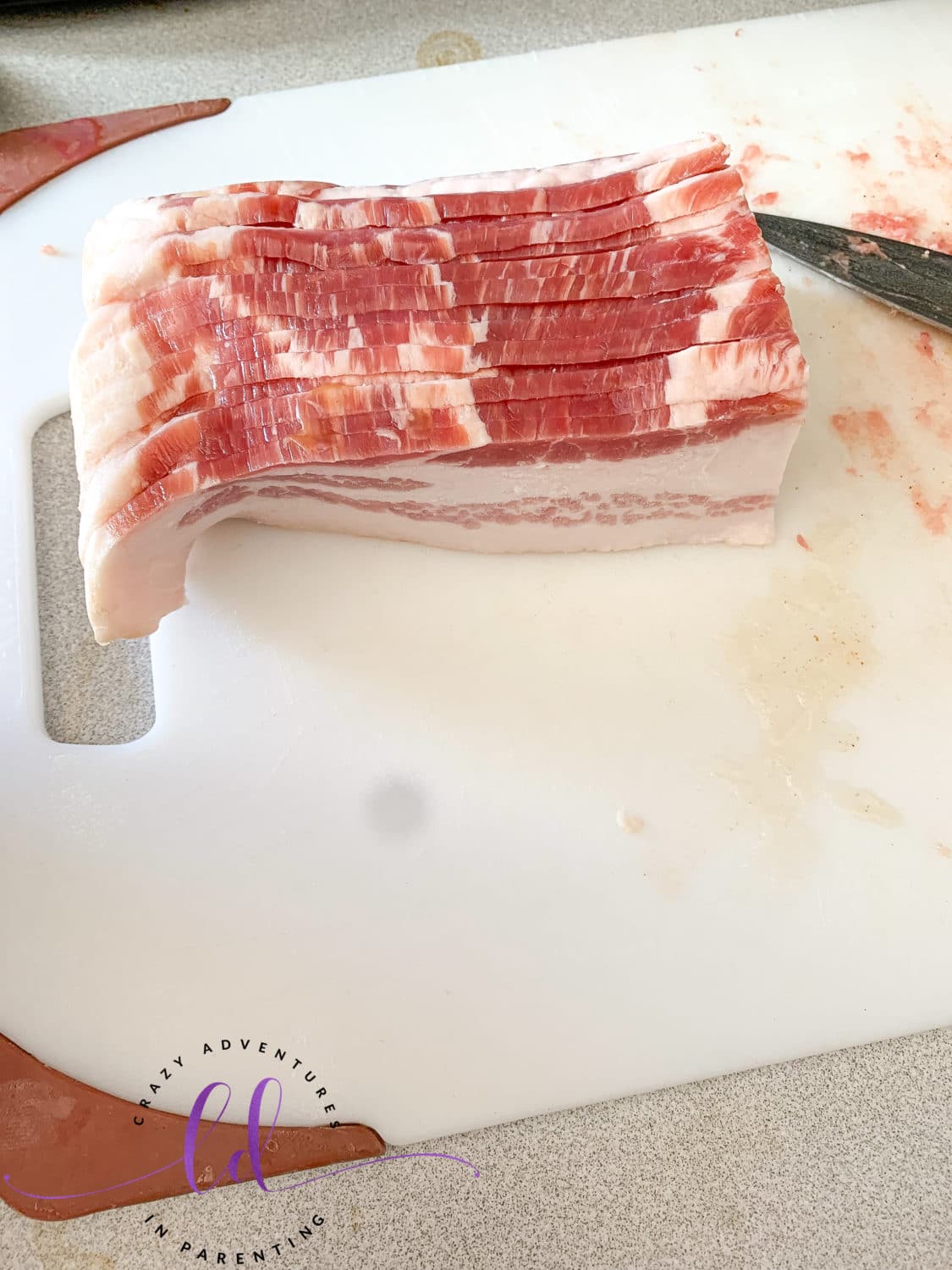 Cut bacon strips to make Bacon Cheesy Baked Egg Italian Toast