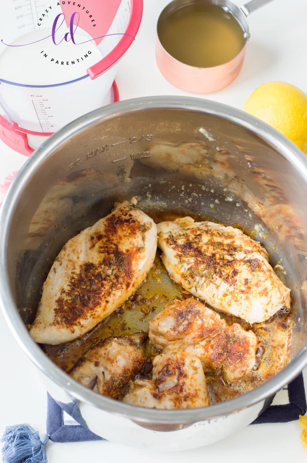 Brown the chicken breasts for Instant Pot Lemon Butter Chicken Recipe