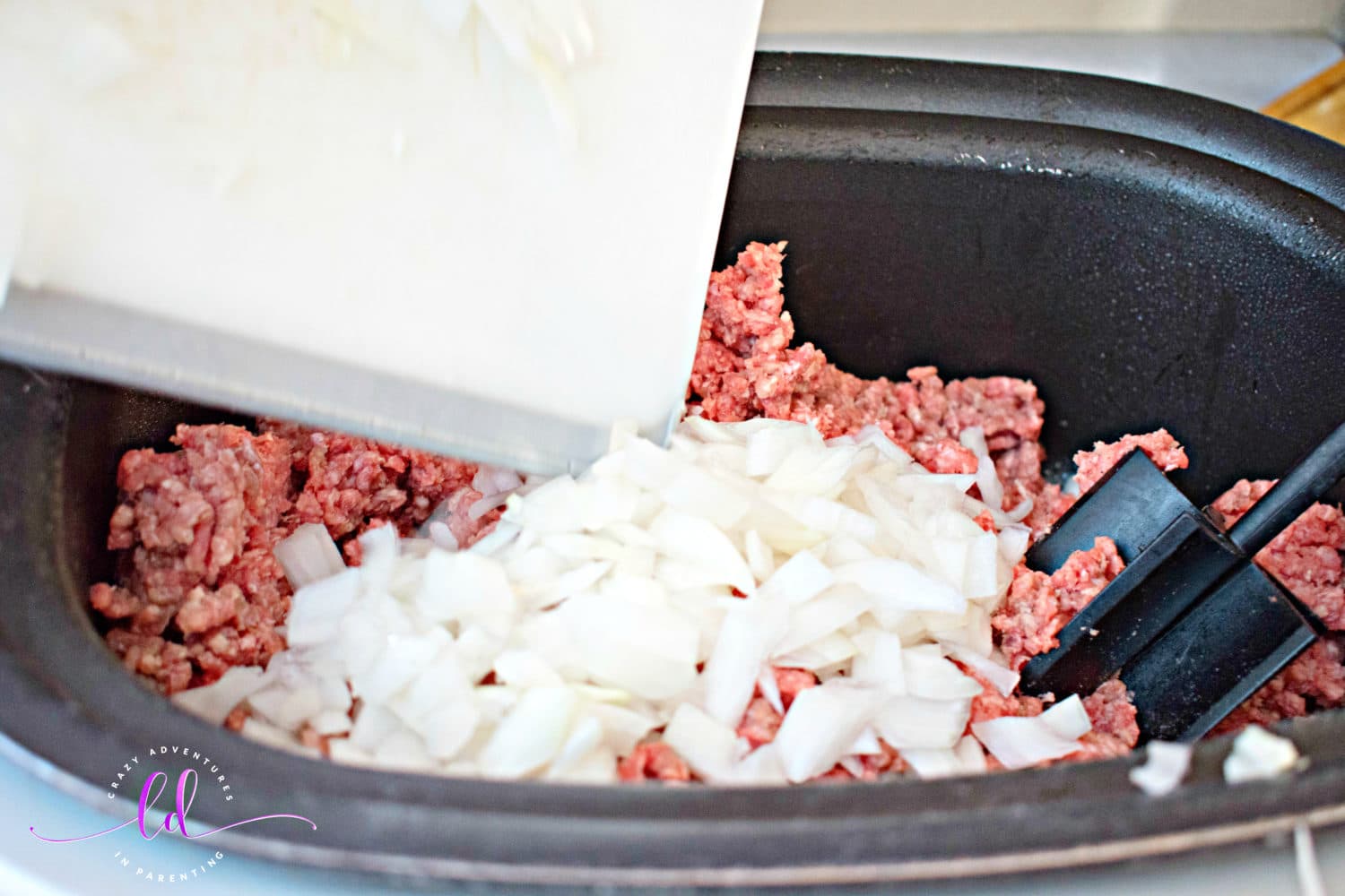 Add chopped onions to Slow Cooker Sloppy Joes