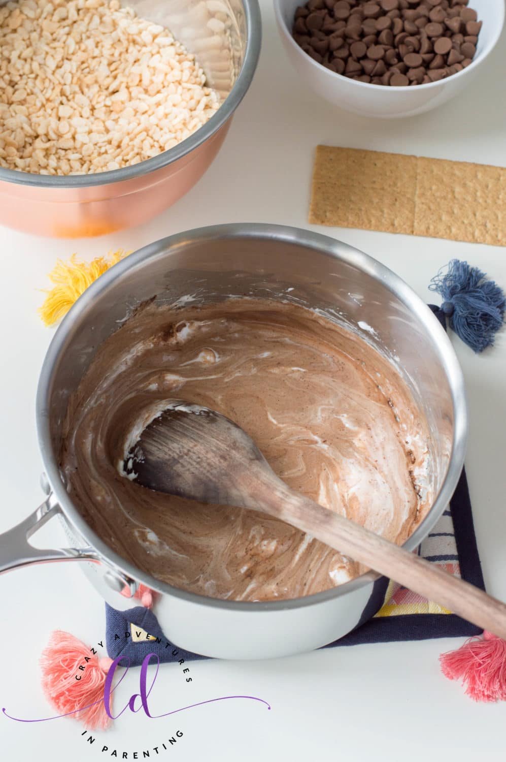 Add Cocoa to Melted Marshmallows for S'mores Rice Krispies Treats