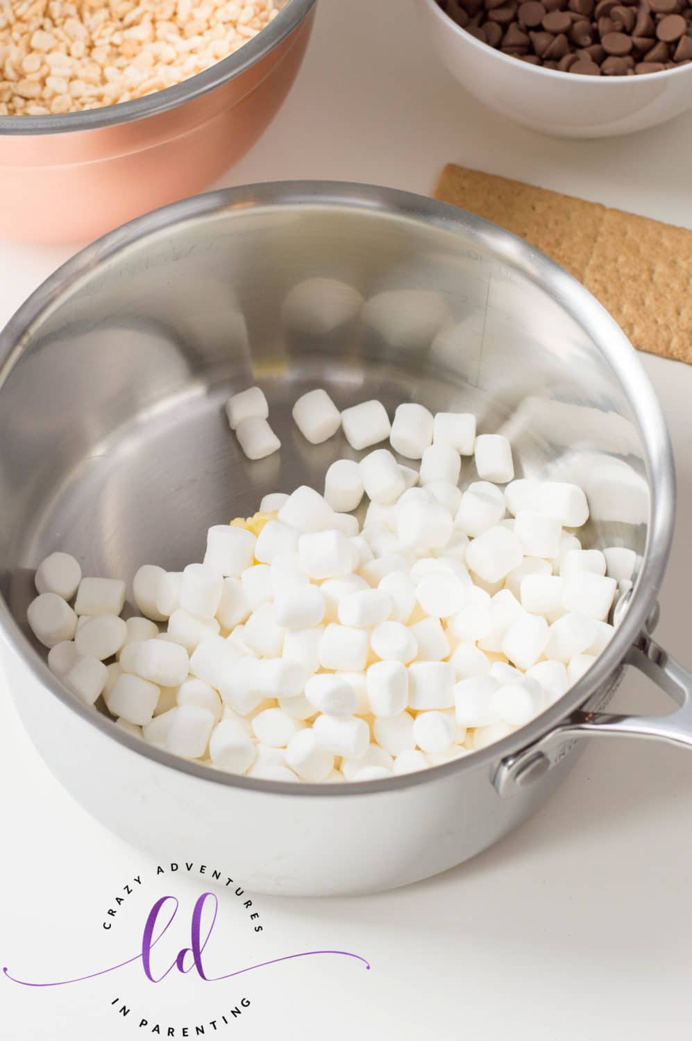 Add Marshmallows to Butter for S'mores Rice Krispies Treats