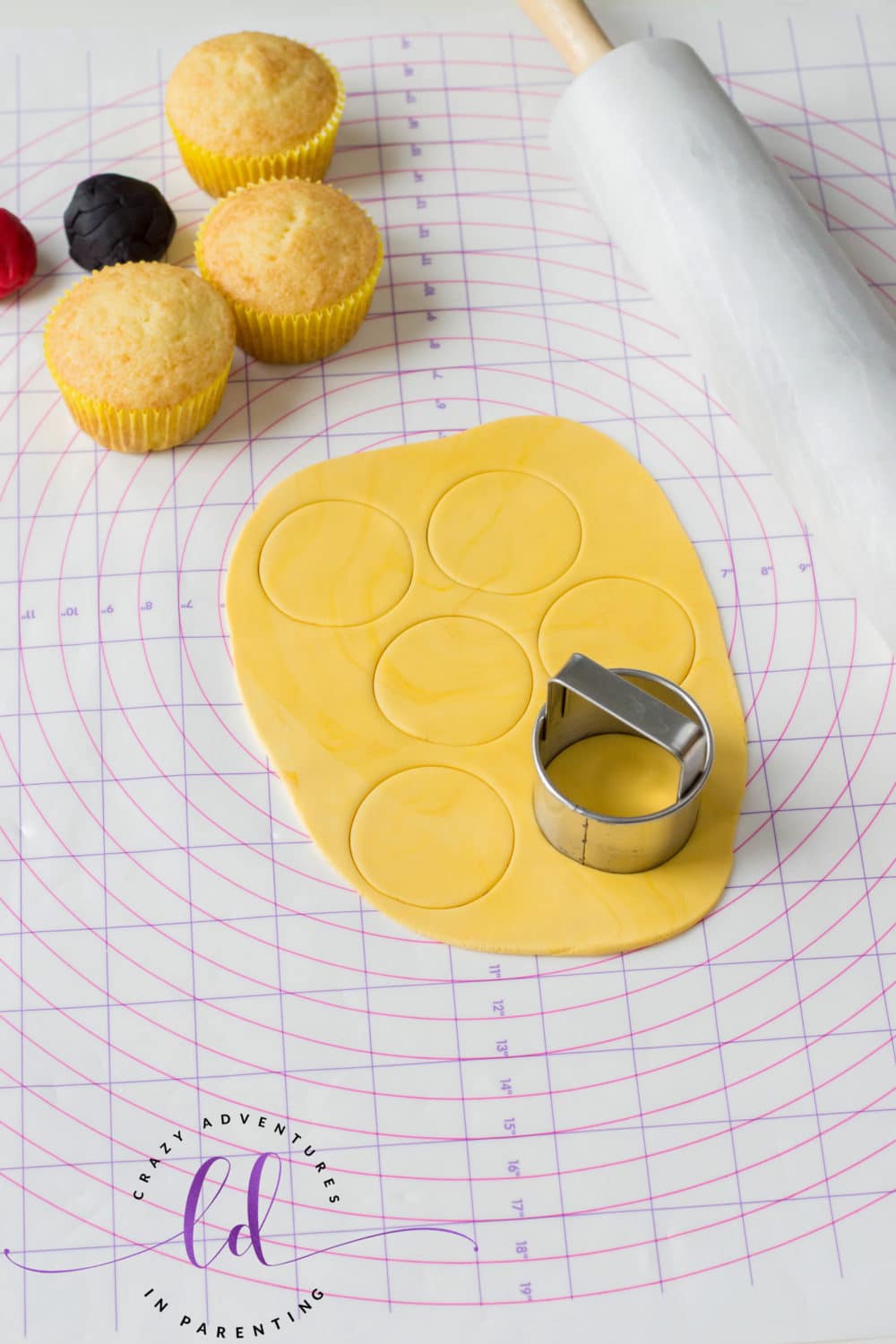 Cut Out Circles for Heart Eyes Emoji Cupcakes