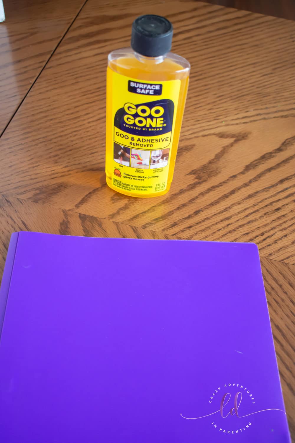 Folder with Sticker After Using Goo Gone