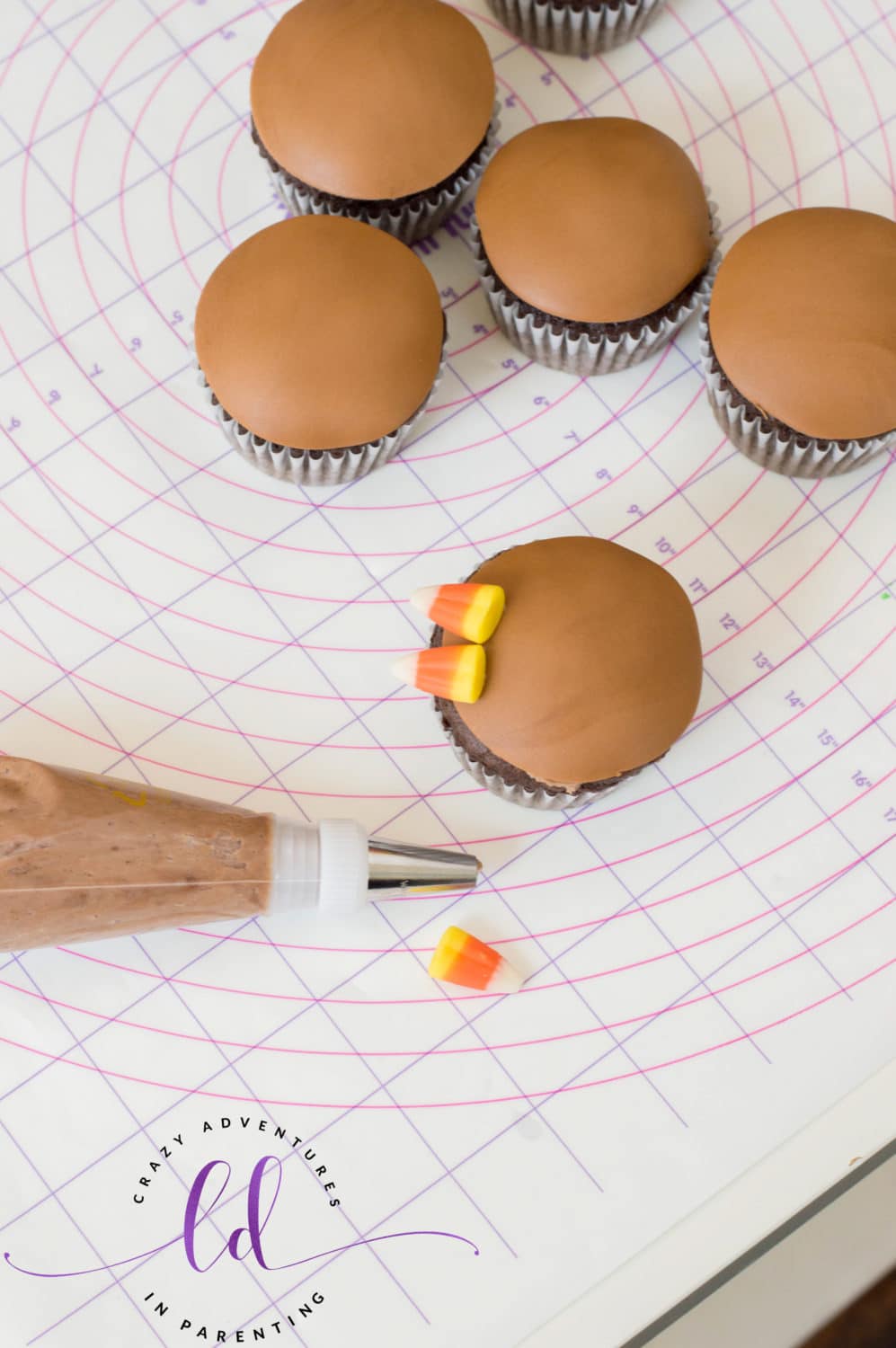 Add Candy Corn to the Tops of Turkey Cupcakes