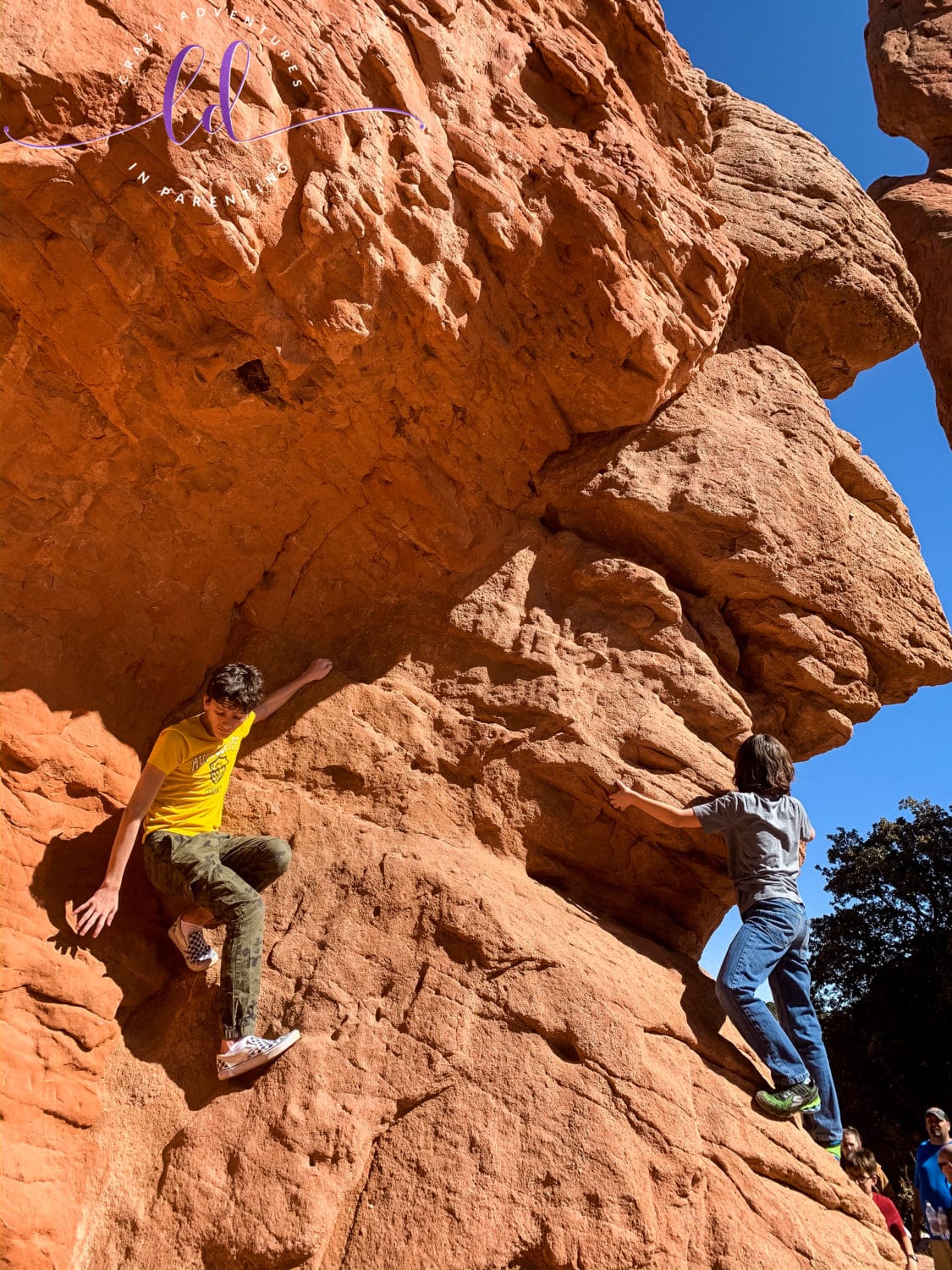 Brothers climbing together