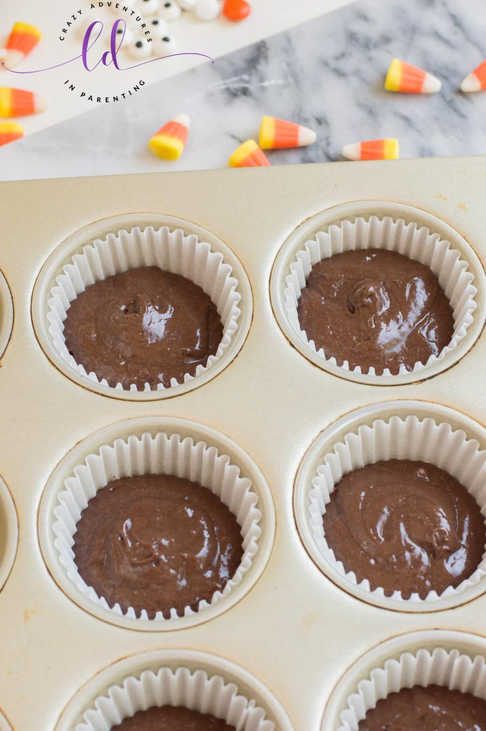 Chocolate Batter in Cupcake Pan to Make Turkey Cupcakes for Thanksgiving
