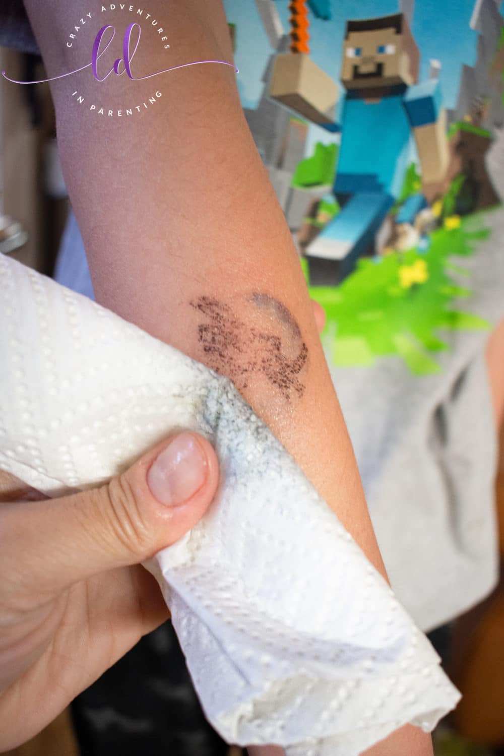 Wipe Temporary Tattoo Away with Goo Gone Bandage and Adhesive Remover