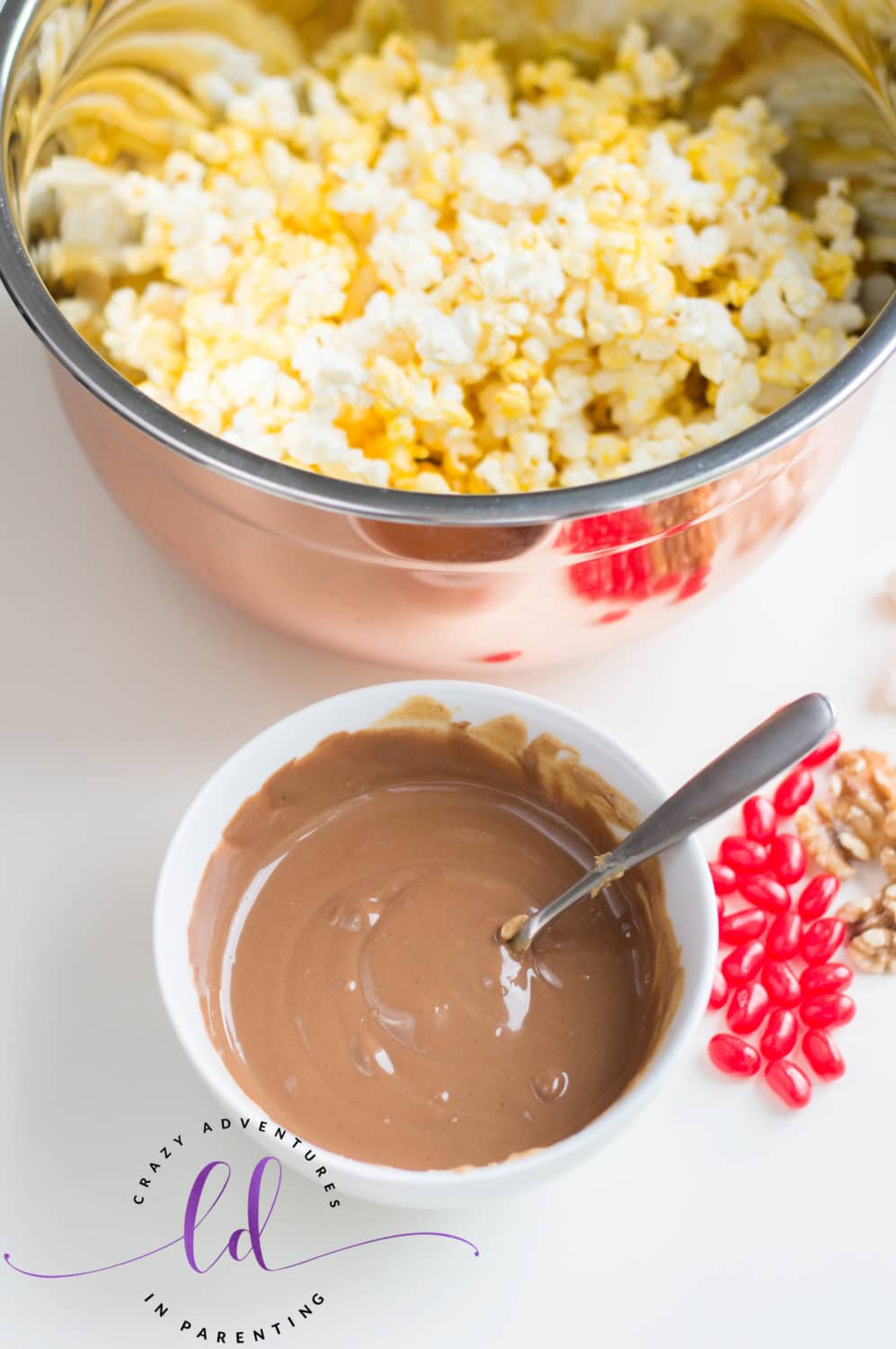 Melted peanut butter and chocolate for Christmas Popcorn Recipe