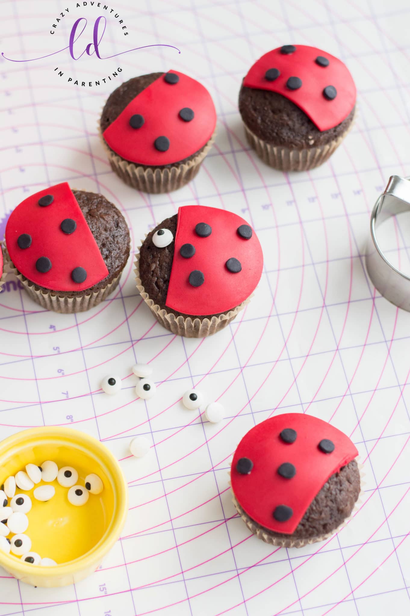 Apply Dots and Candy Eyes onto Ladybug Lovebug Cupcakes