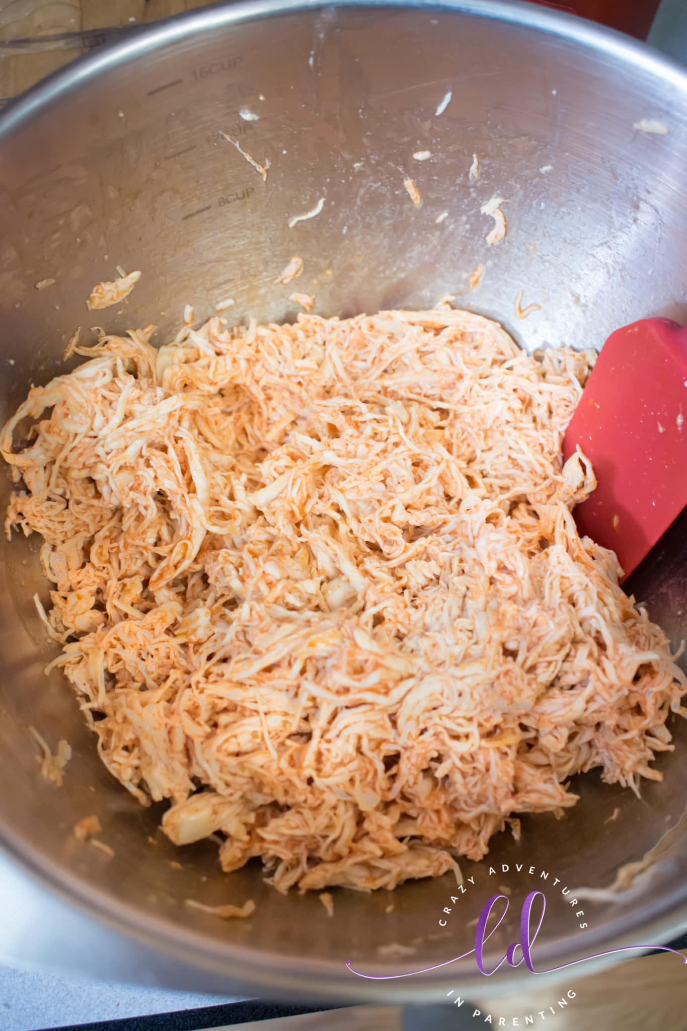 Mix Sauce into Shredded Chicken to Make Buffalo Chicken Bacon Ranch Quesadillas