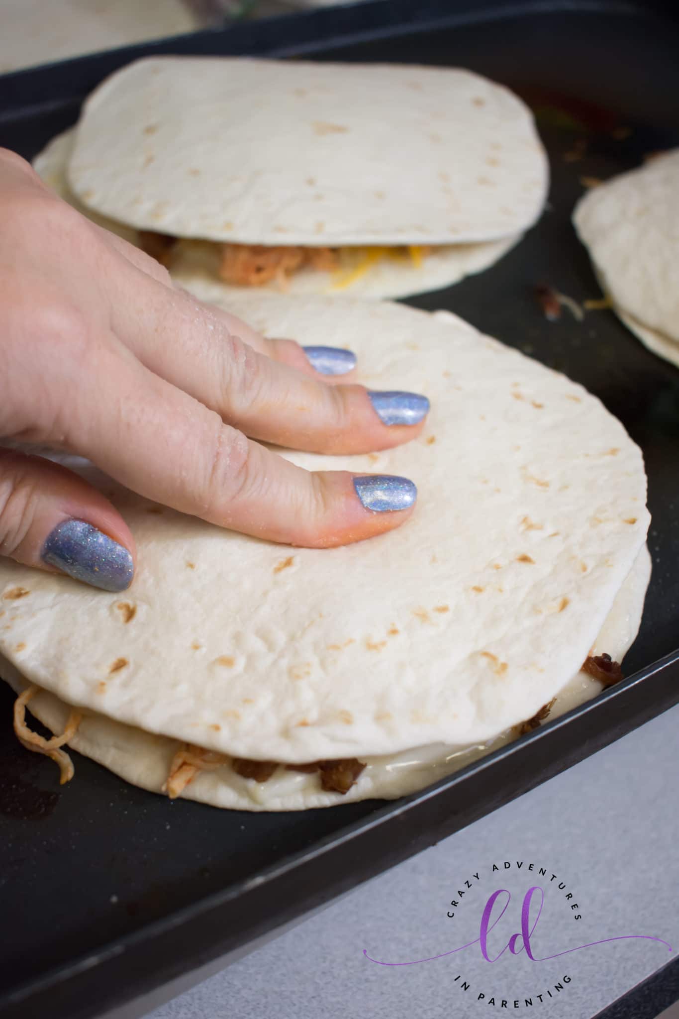 Place Top Tortilla onto Buffalo Chicken Bacon Ranch Quesadillas