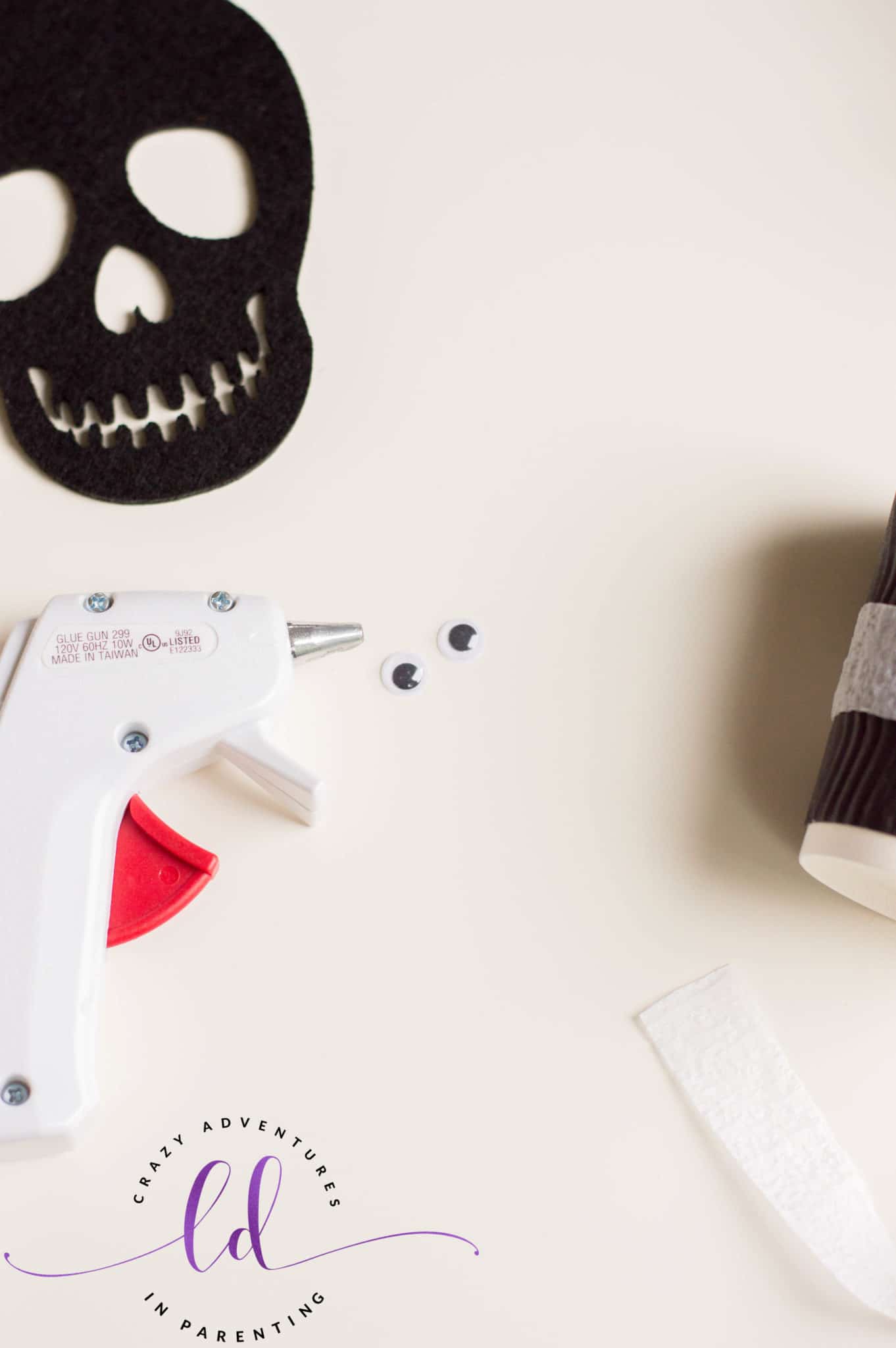 Attach Googly Eyes to Make DIY Mummy Treat Cups for Halloween