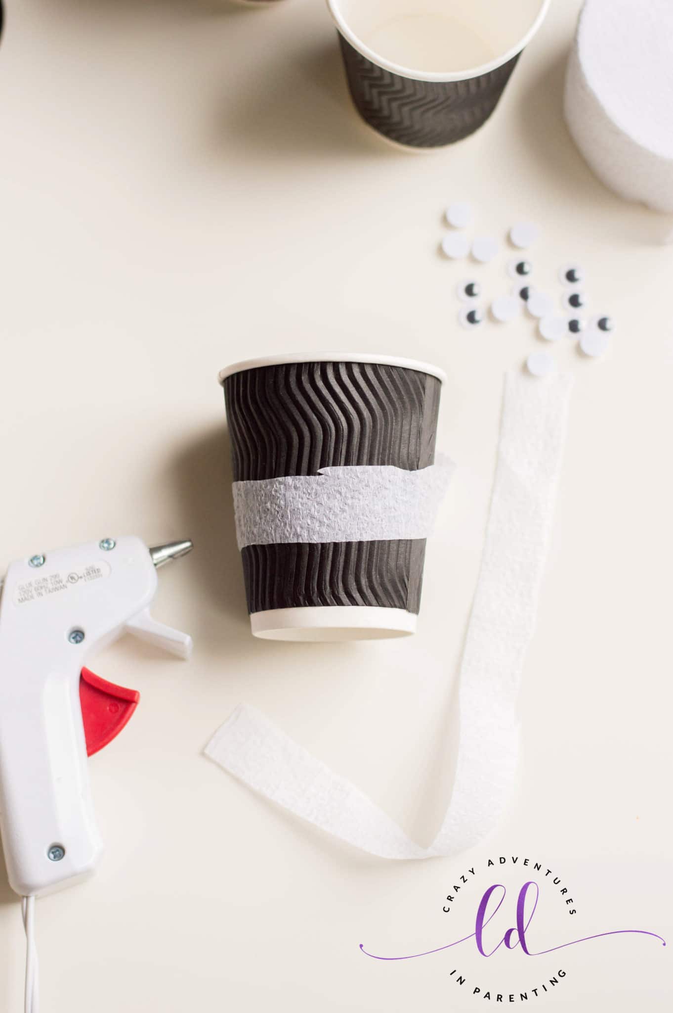 Glue Streamers to the Cups for DIY Mummy Treat Cups