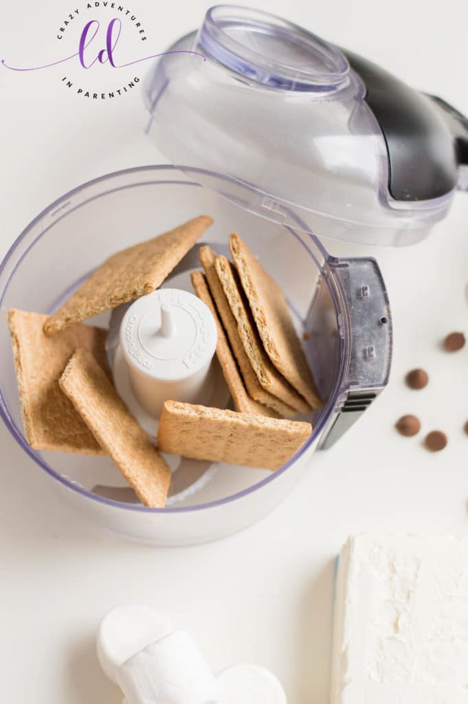 Pulverize Graham Crackers to Make Crumbs for S'mores Mini Cheesecakes