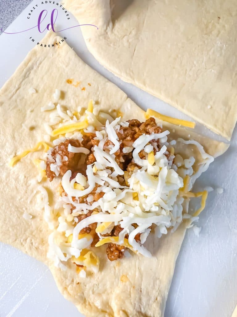 Cheese and Taco Meat Ready to Fold to Make Easy Beef Empanadas