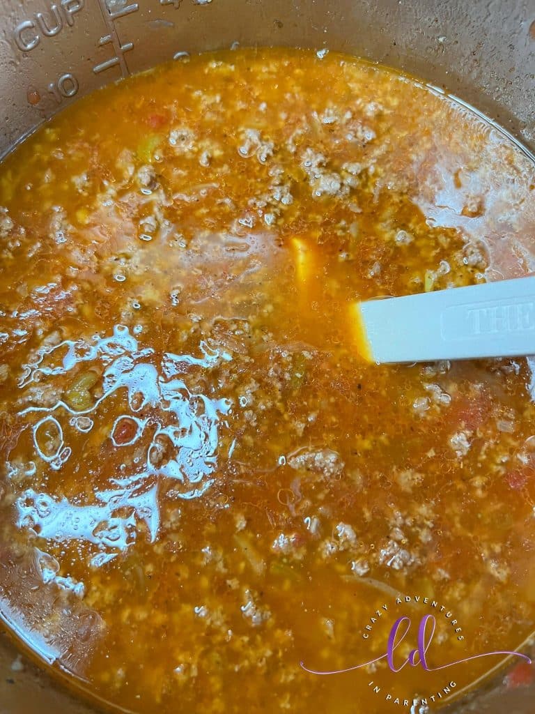 Add Broth and Uncooked Pasta to Make Easy Instant Pot Taco Macaroni